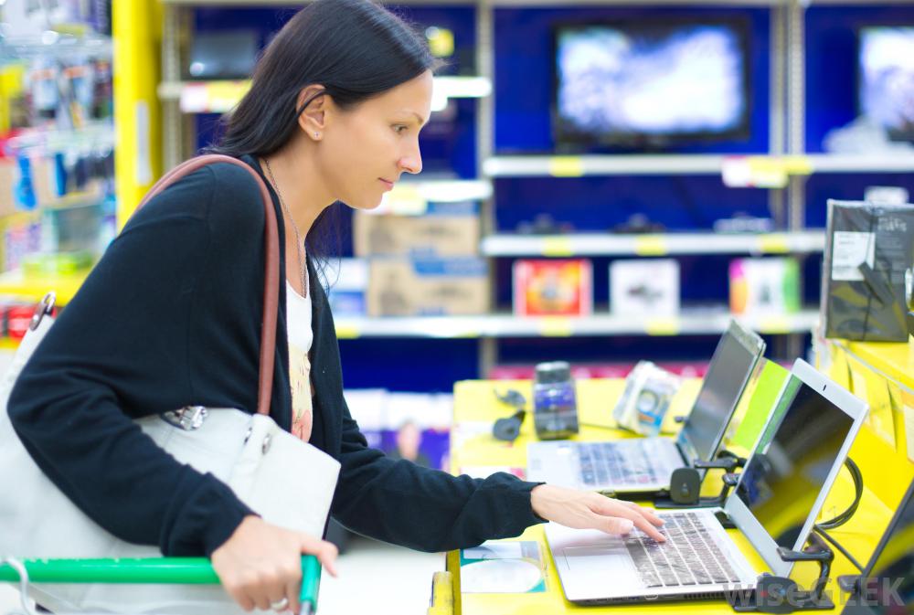woman in store looking at computer