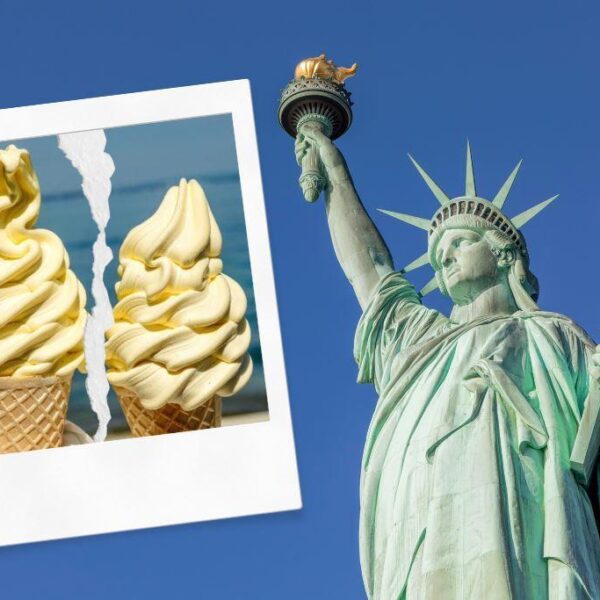 A torn up photo of 2 softee cones with Statue of Liberty in the background