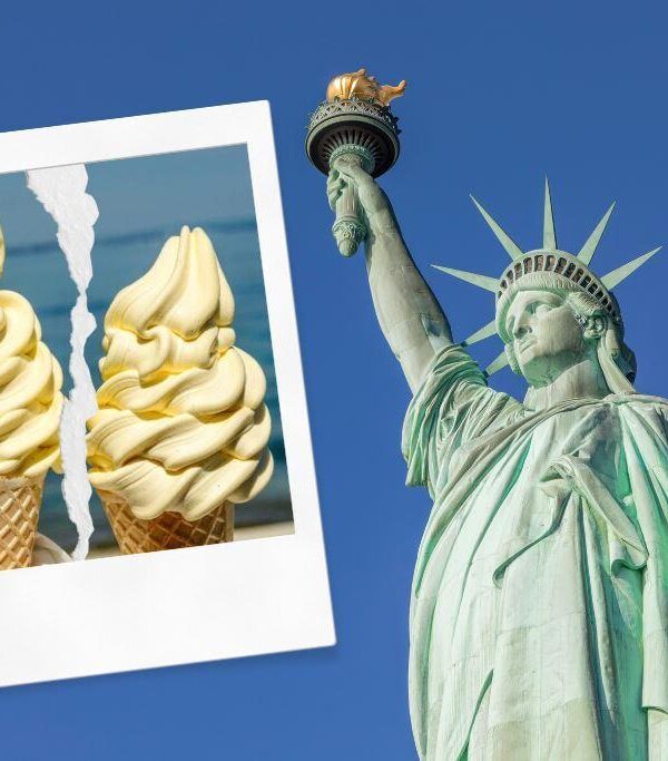 A torn up photo of 2 softee cones with Statue of Liberty in the background